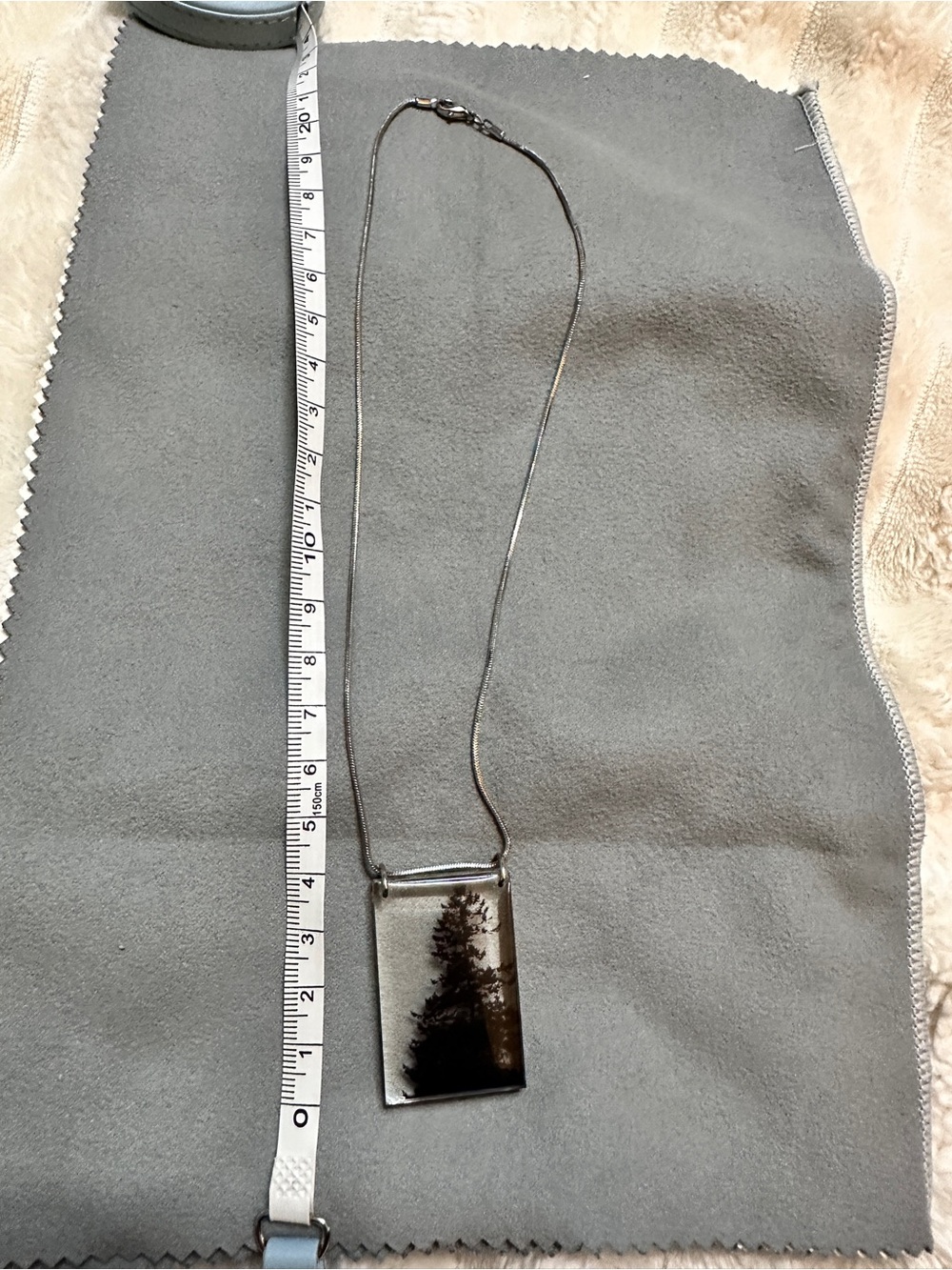 Silver-tone Clear Resin Artisan Pendant Necklace with Black Tree